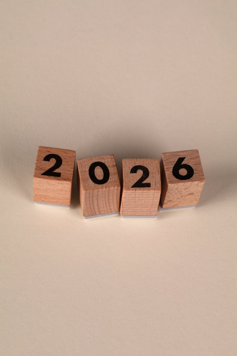 Wooden blocks arranged to show the year 2026, perfect for New Year themes.